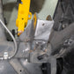 Trailing arm pivot gusset welded to Can-Am Maverick R chassis showing finished reinforcement