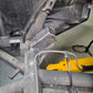 Can-Am Maverick R trailing arm pivot gusset shown next to factory mount for comparison
