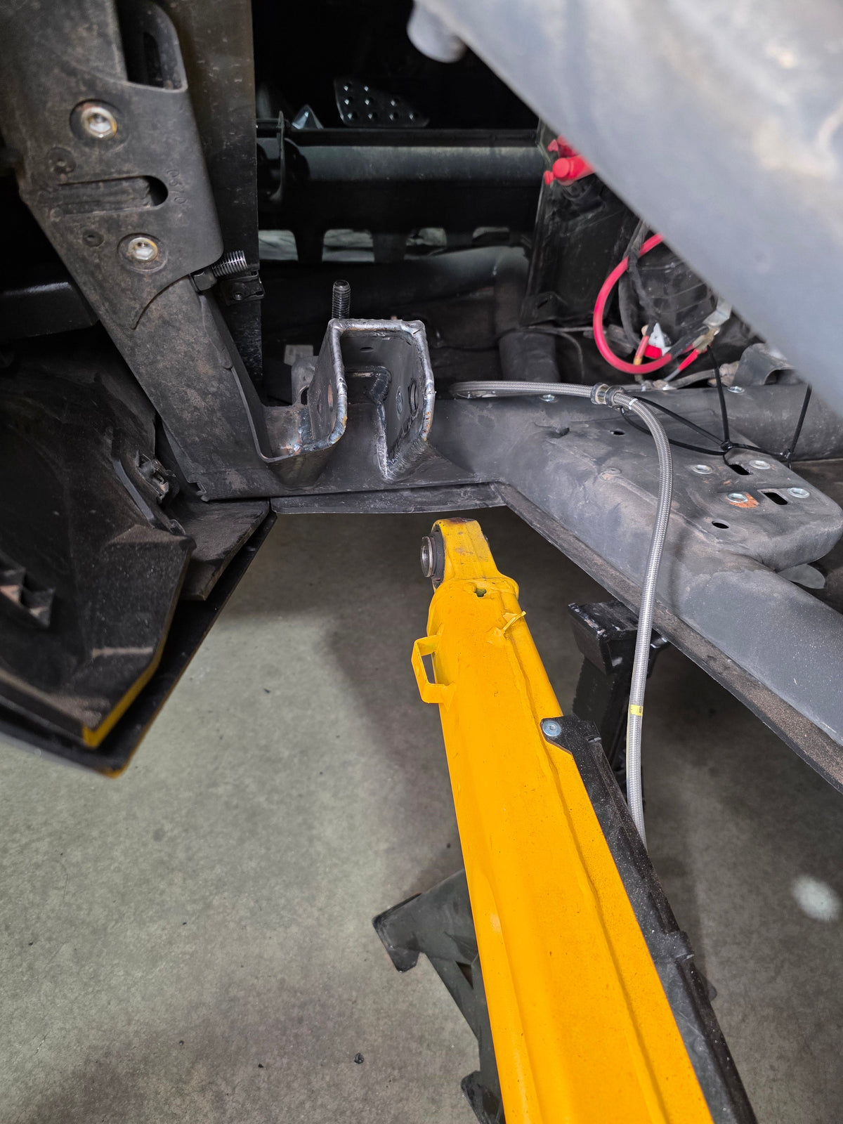 Can-Am Maverick R trailing arm pivot gusset test-fitted to the pivot pocket before final welding