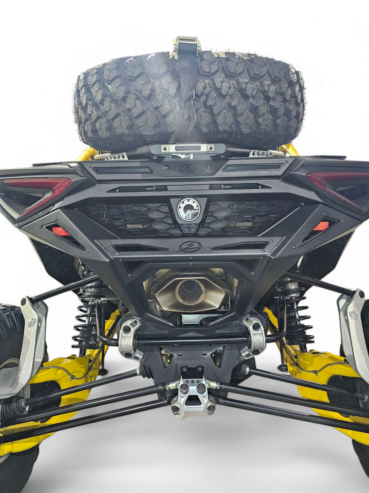 Underside view of Can-Am Maverick R clear billet radius rod plate showing suspension protection coverage