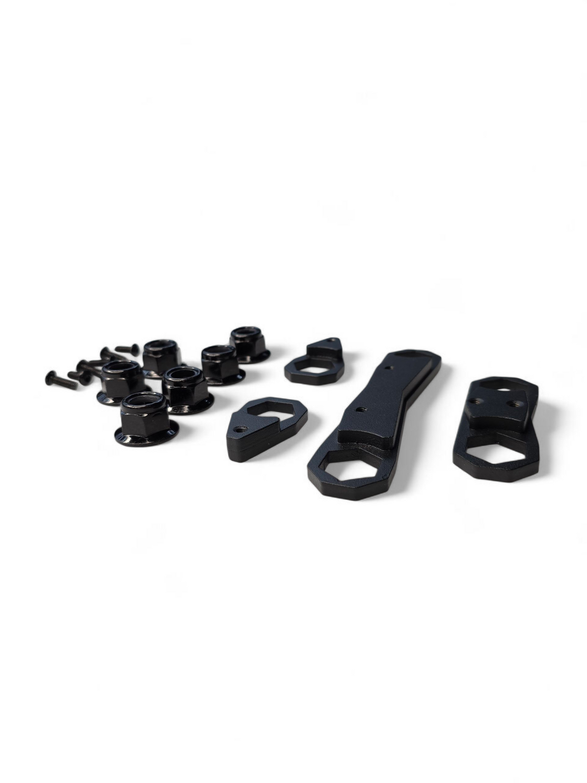 Close-up of the nut plate kit hardware for the Can-Am Maverick R, showing M5 bolts and M14 Nylock nuts