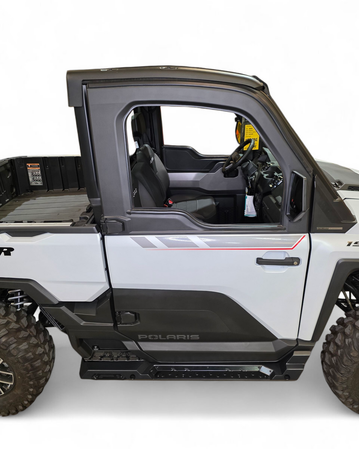 Passenger side rock slider on Polaris Ranger XD 1500 showing frame protection