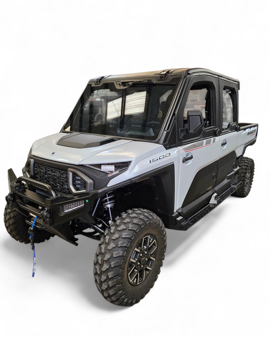 Volt Rock Sliders installed on 2024 Polaris Ranger XD 1500 4 seat showing steel rock guards with non-slip step