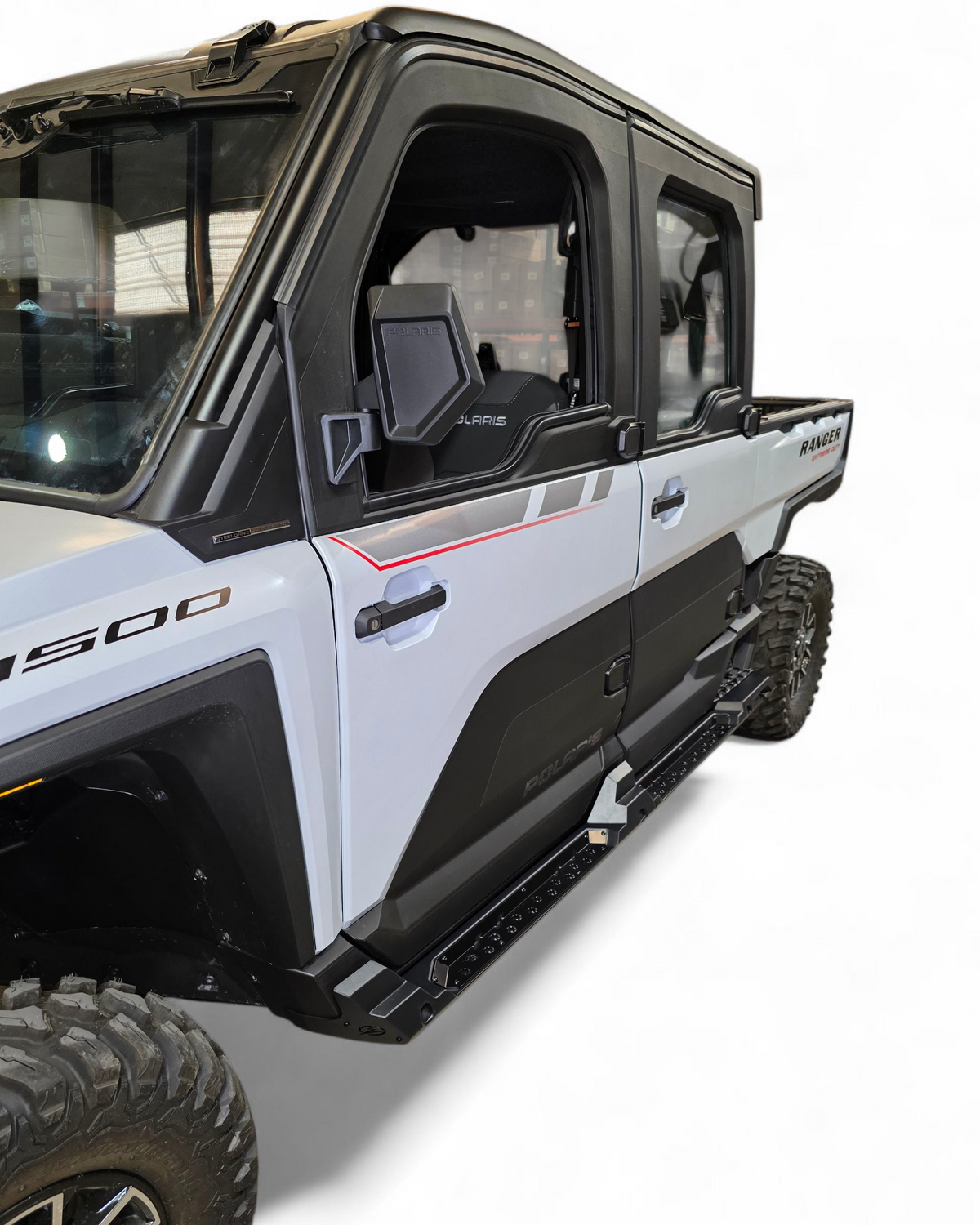 Polaris Ranger XD 1500 4-seat rock sliders shown along the frame sides in hammer black