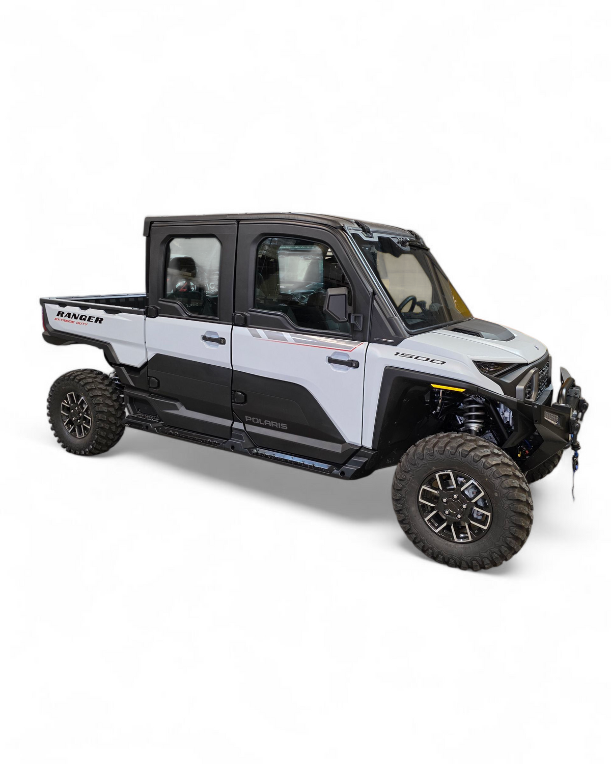 Passenger side rock slider on Polaris Ranger XD 1500 showing frame protection