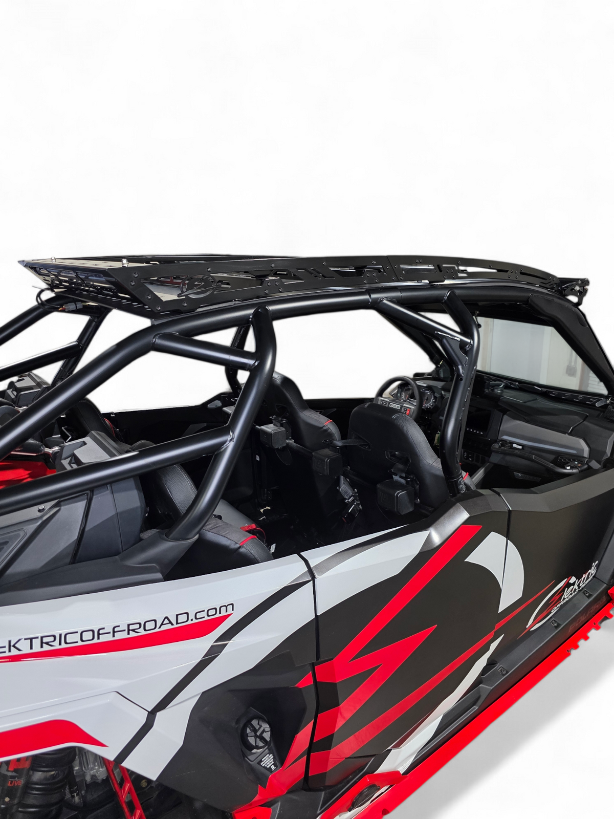 Full machine view of 2025 Polaris RZR Pro R 4 seat fitted with roof rack