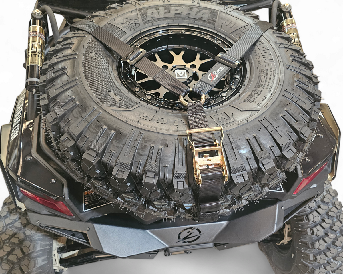 EOD Tire Y Strap shown securing an oversized off-road spare tire up to 40 inches
