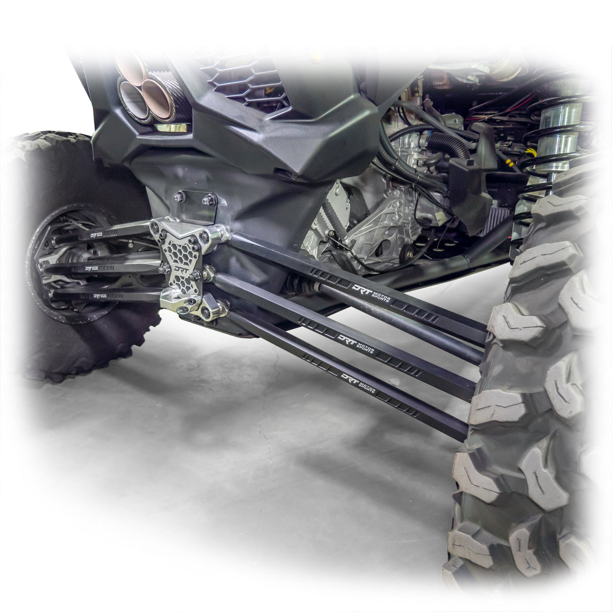 Installed barrel radius rod kit under rear control arm of Maverick X3 on both wheels