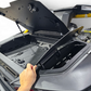 Volt Baja Box lid open on Can-Am Maverick R showing all three separate storage
    compartments and gas strut lid assist mechanism holding lid open hands-free