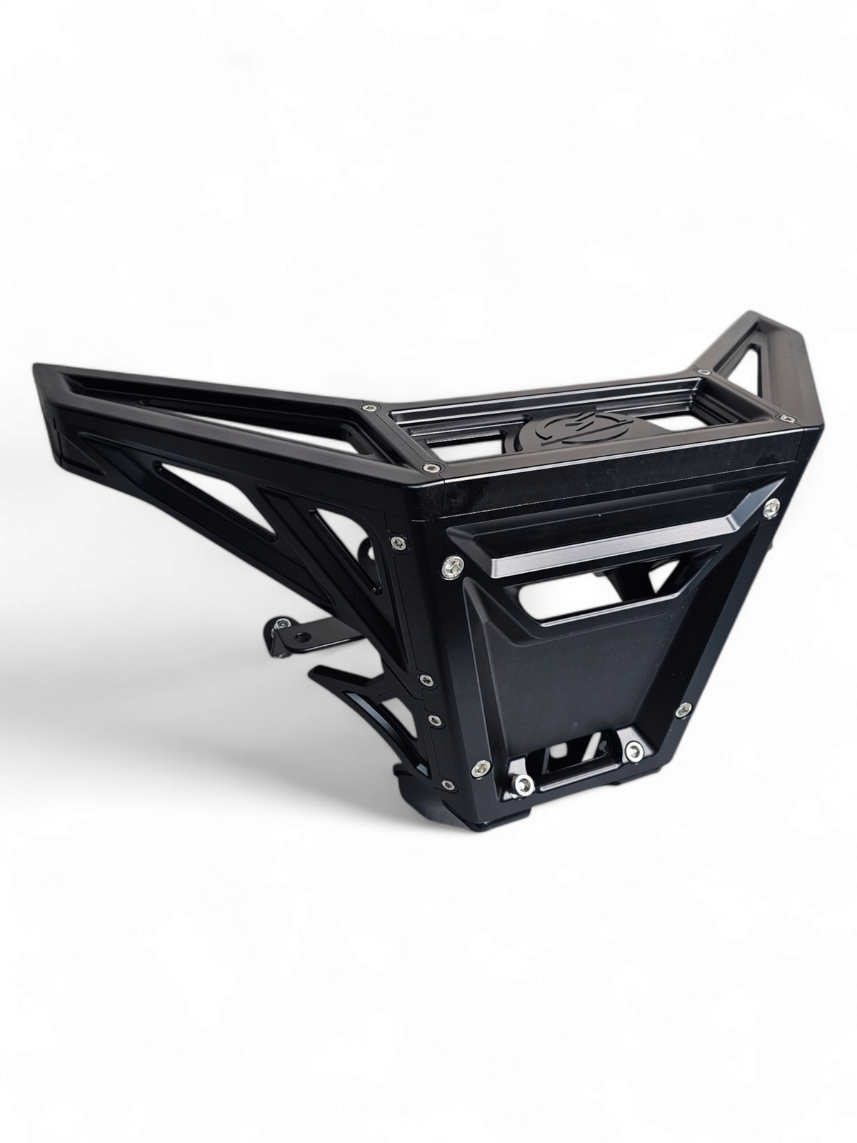 Front three-quarter view of black anodized billet winch bumper installed on Can-Am Maverick X3 showing dual light mounts