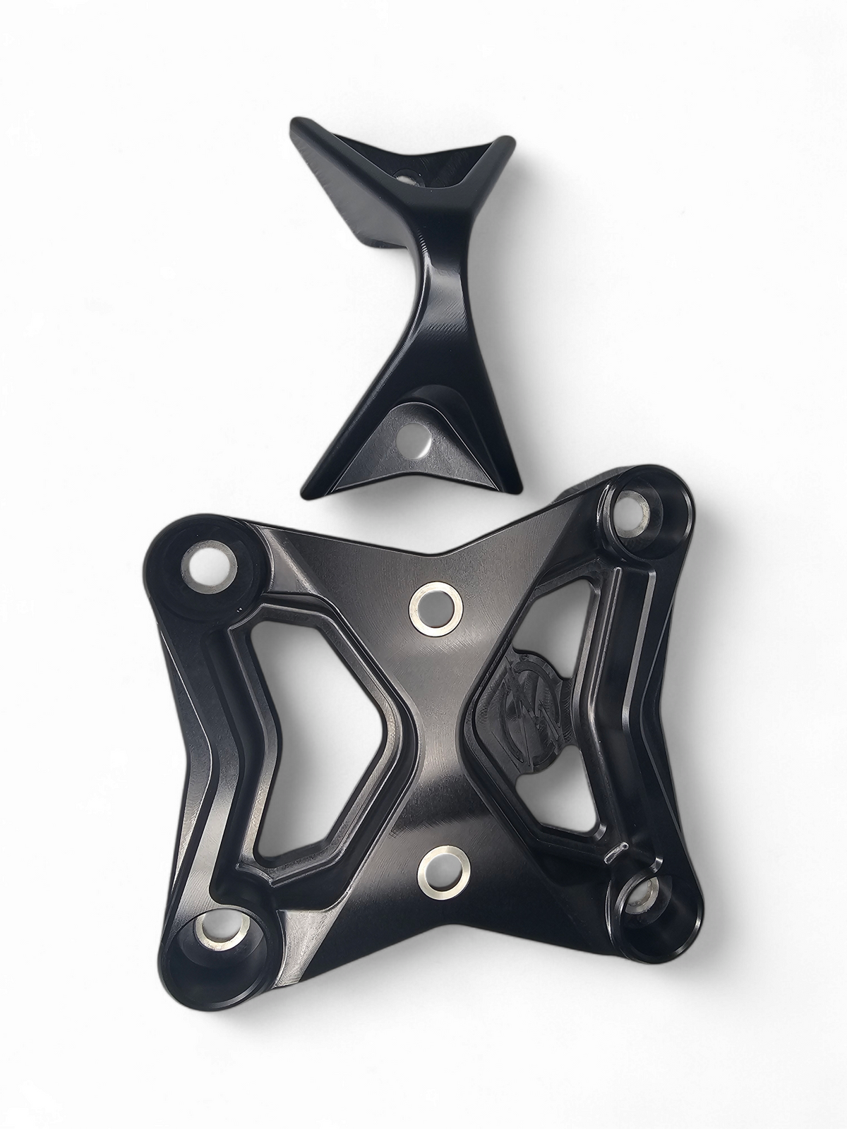 Black anodized XL radius rod plate installed on Can-Am Maverick X3 protecting rear suspension heim joints