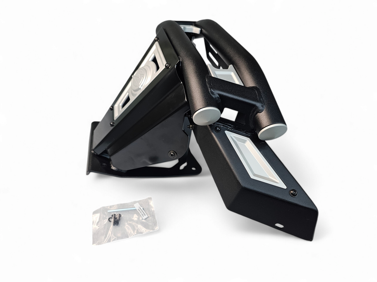 Billet insert close-up on Can-Am Maverick X3 Amp front bumper showing CNC machined detail