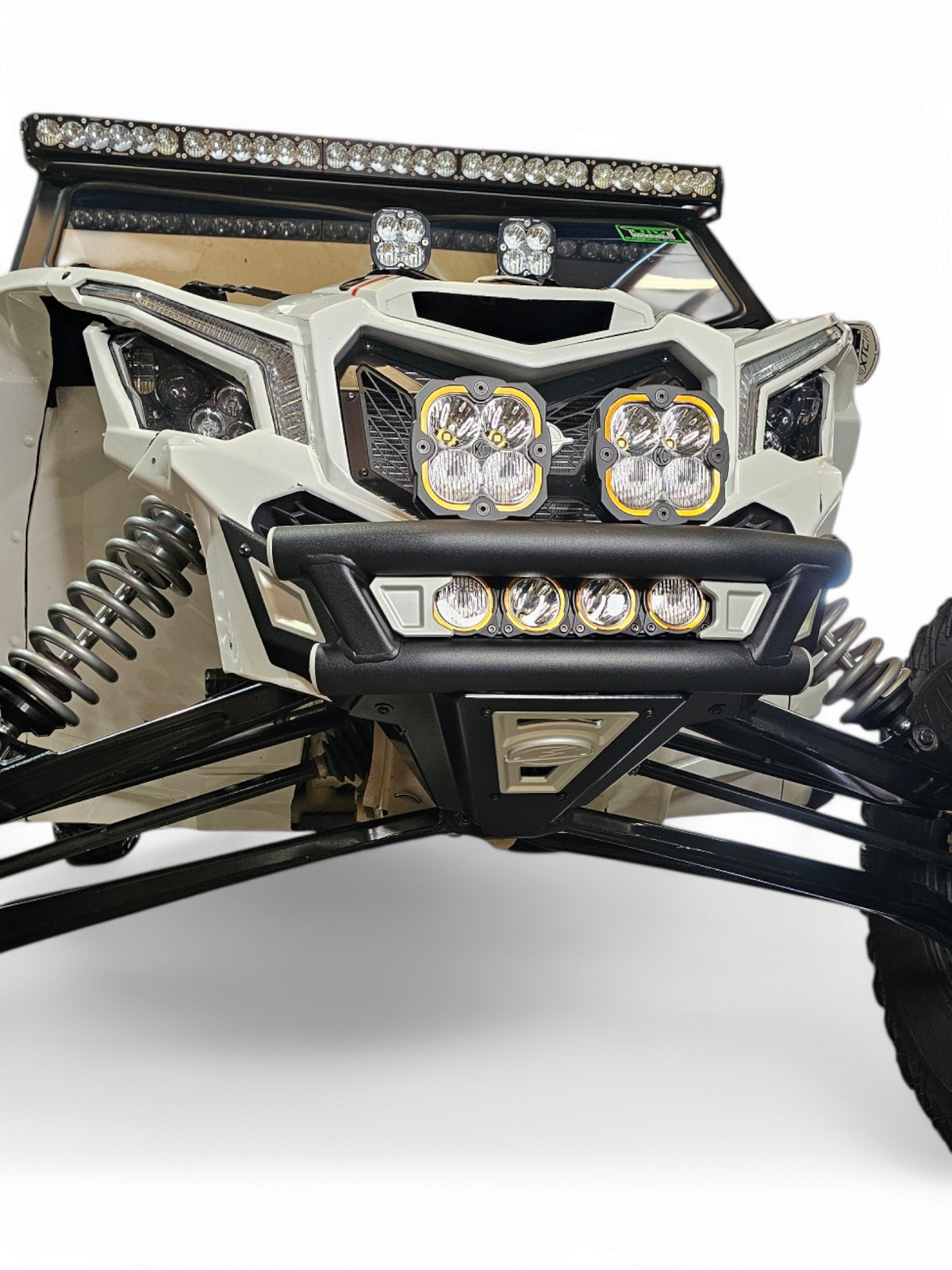 Amp Series front bumper installed on Can-Am Maverick X3 showing dune-style tubular design and hammer black finish