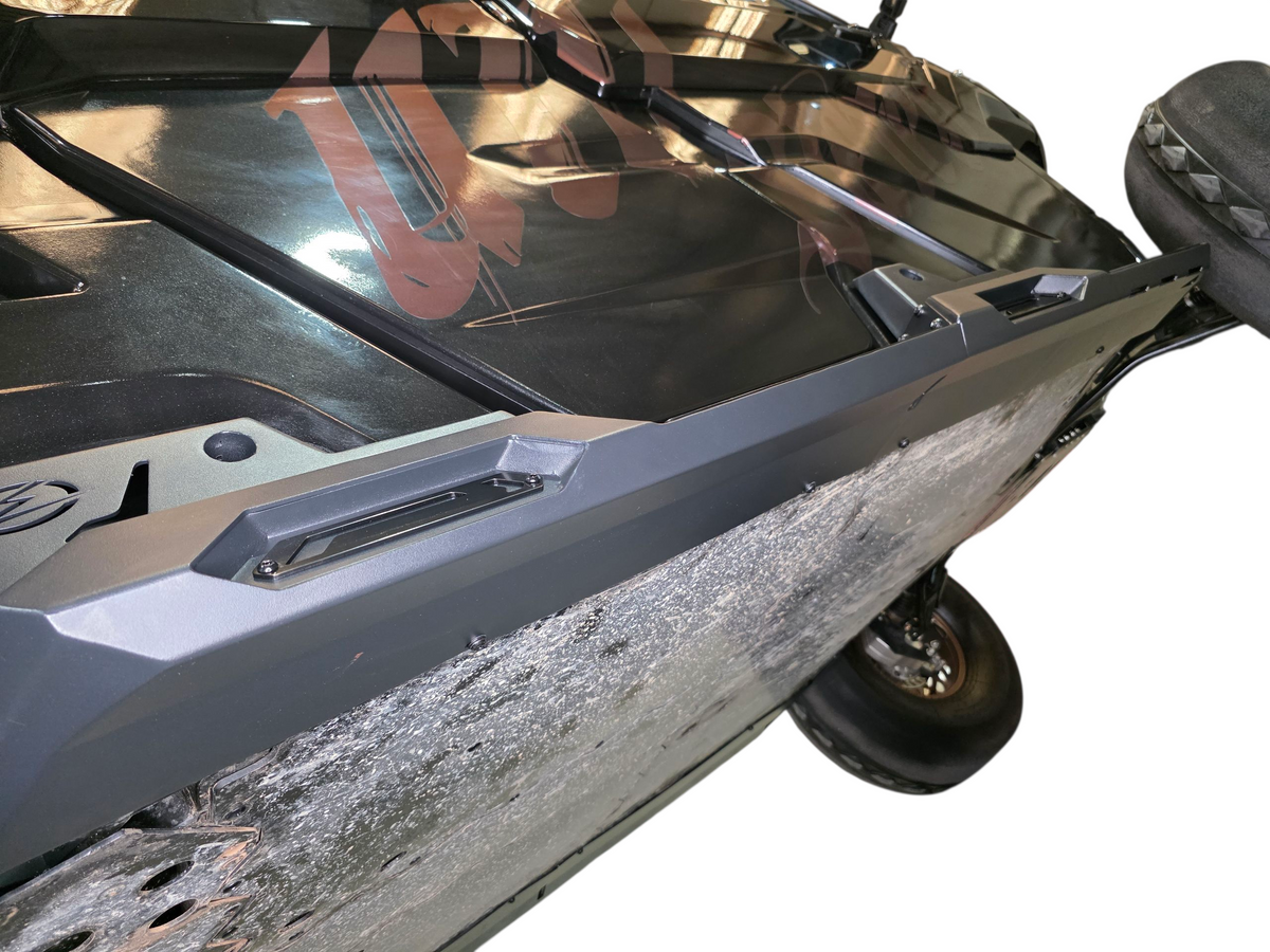 Satin black aluminum accent plate detail on Can-Am Defender Volt Rock Steps