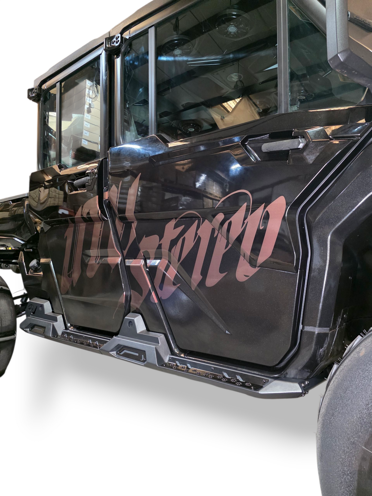 Grip plating texture detail on Can-Am Defender Volt Rock Steps step surface