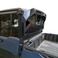 Rear three-quarter view of Can-Am Defender HD10 HD11 Headache Rack showing steel and aluminum construction