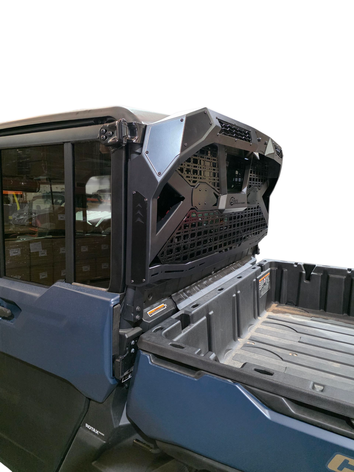 Rear three-quarter view of Can-Am Defender HD10 HD11 Headache Rack showing steel and aluminum construction