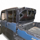 Headache Rack installed on Can-Am Defender HD10 showing MOLLE panels and hammer black finish