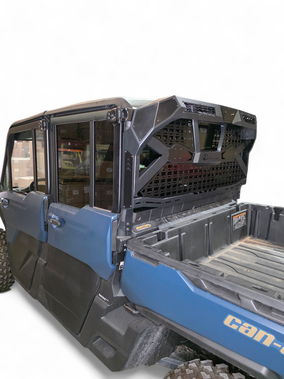 Headache Rack installed on Can-Am Defender HD10 showing MOLLE panels and hammer black finish