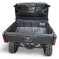 Light and whip mounts on Can-Am Defender Headache Rack for rear visibility