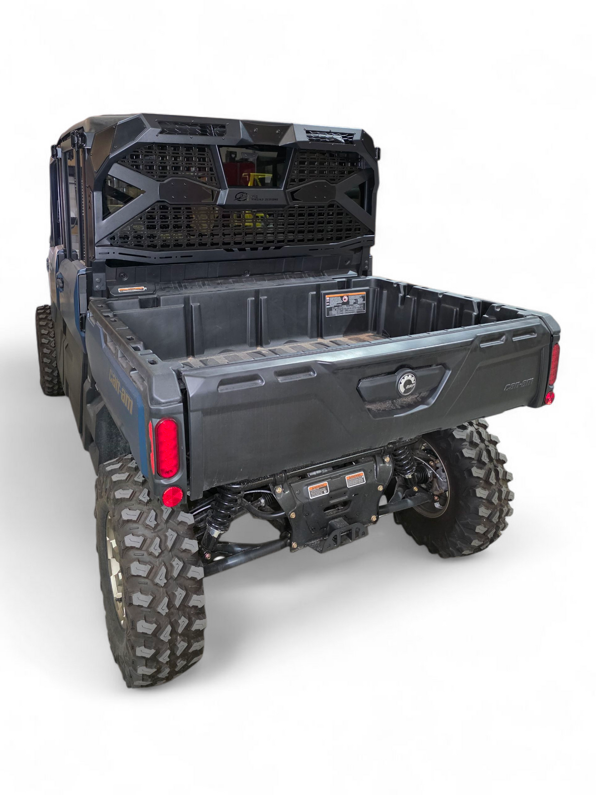 Can-Am Defender Headache Rack showing relocated factory cargo light with cover plate