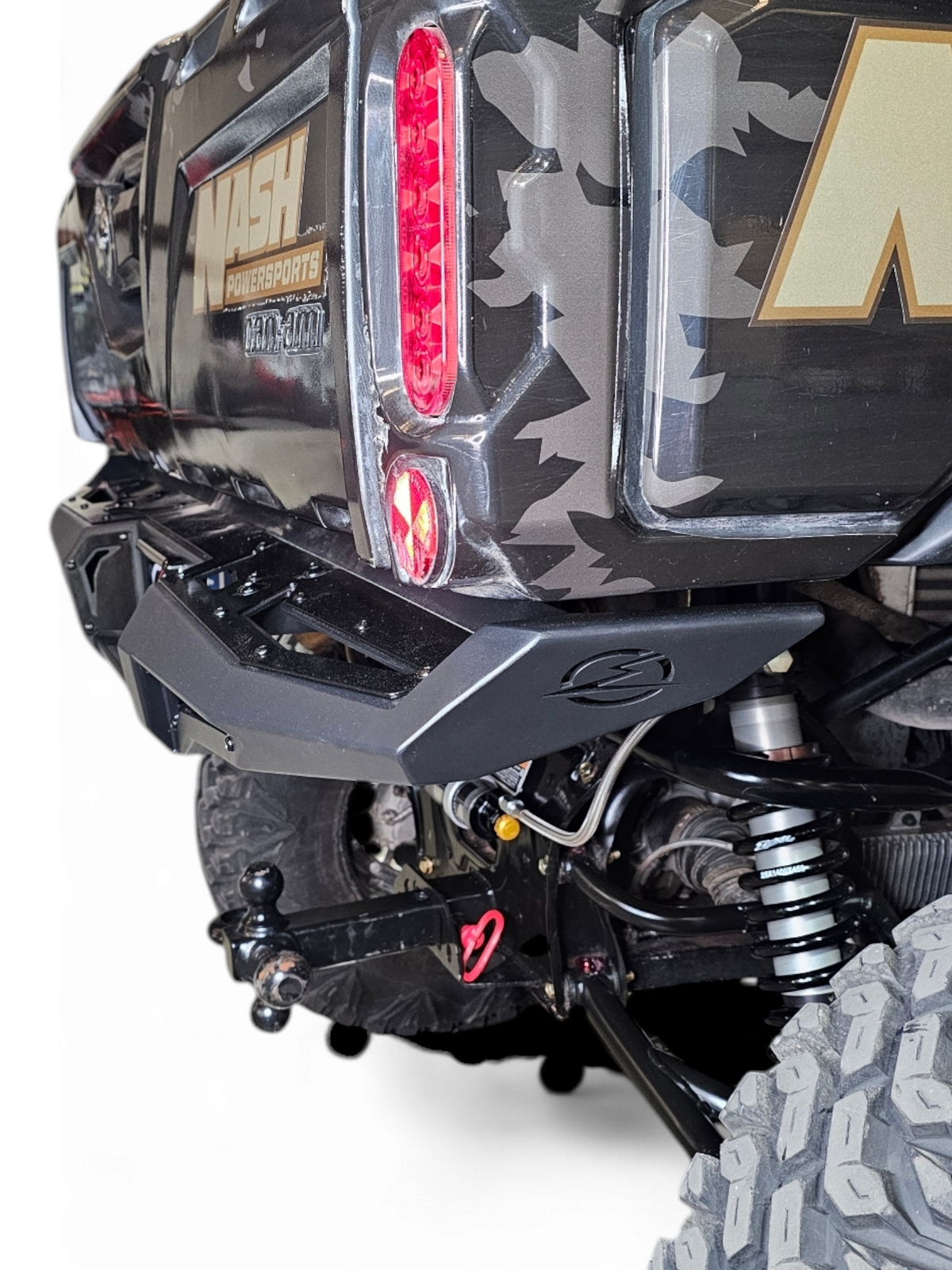 Tilt bed raised on Can-Am Defender with Volt Rear Bumper showing unobstructed function