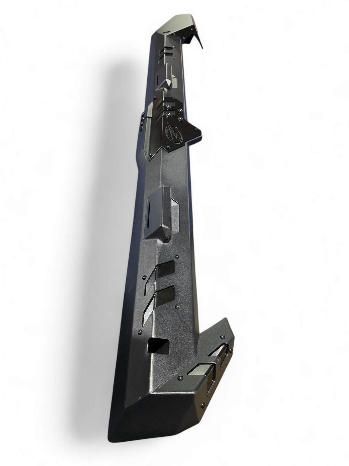 Volt Rocker Steps unboxed showing steel sliders, accent plates, and included hardware for Can-Am Maverick R