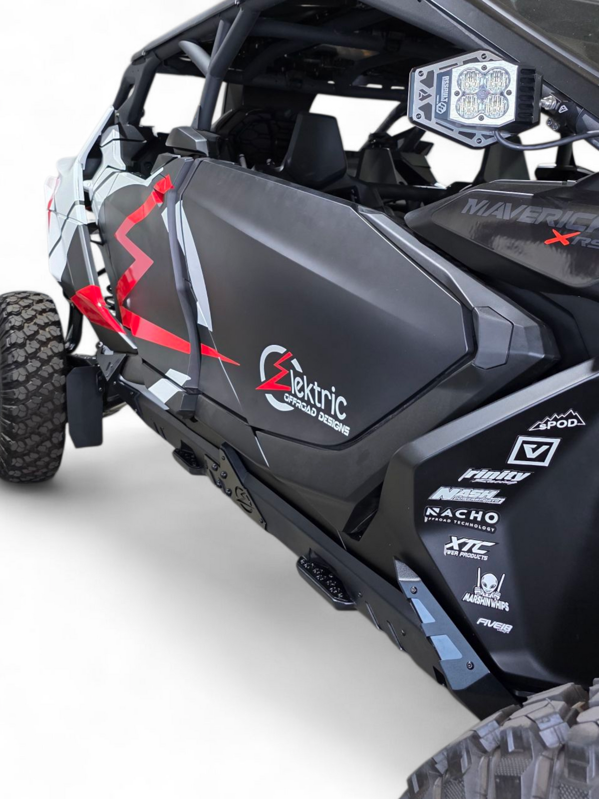 Driver side Volt Rocker Steps installed on 4-seat Can-Am Maverick R showing frame side protection