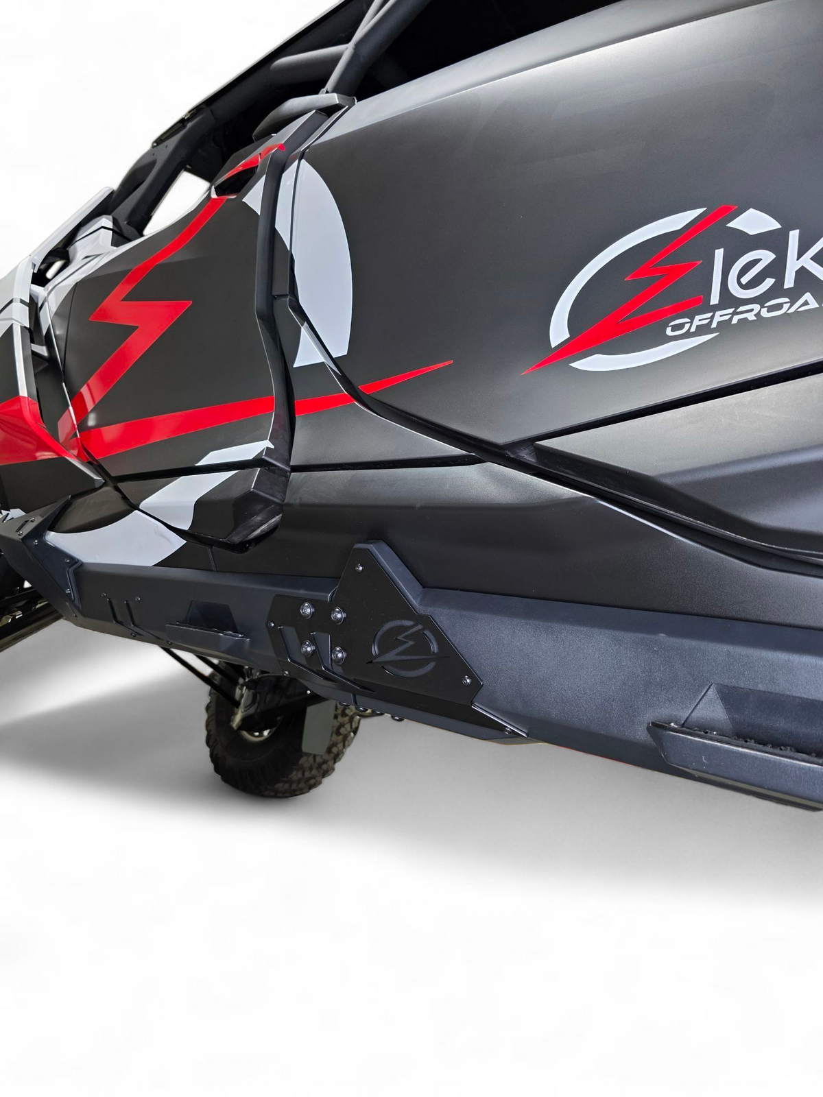 Passenger side Volt Rocker Steps on Can-Am Maverick R 4-seat showing rock slider integration