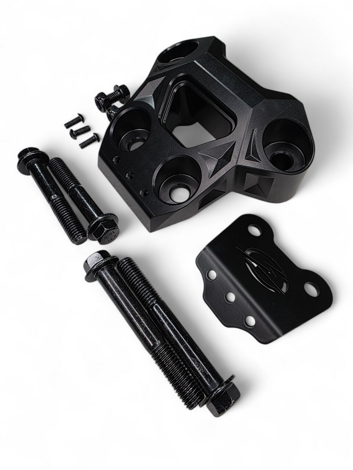 Detail of Can-Am Maverick R billet radius rod plate showing heim joint and rod bolt protection
