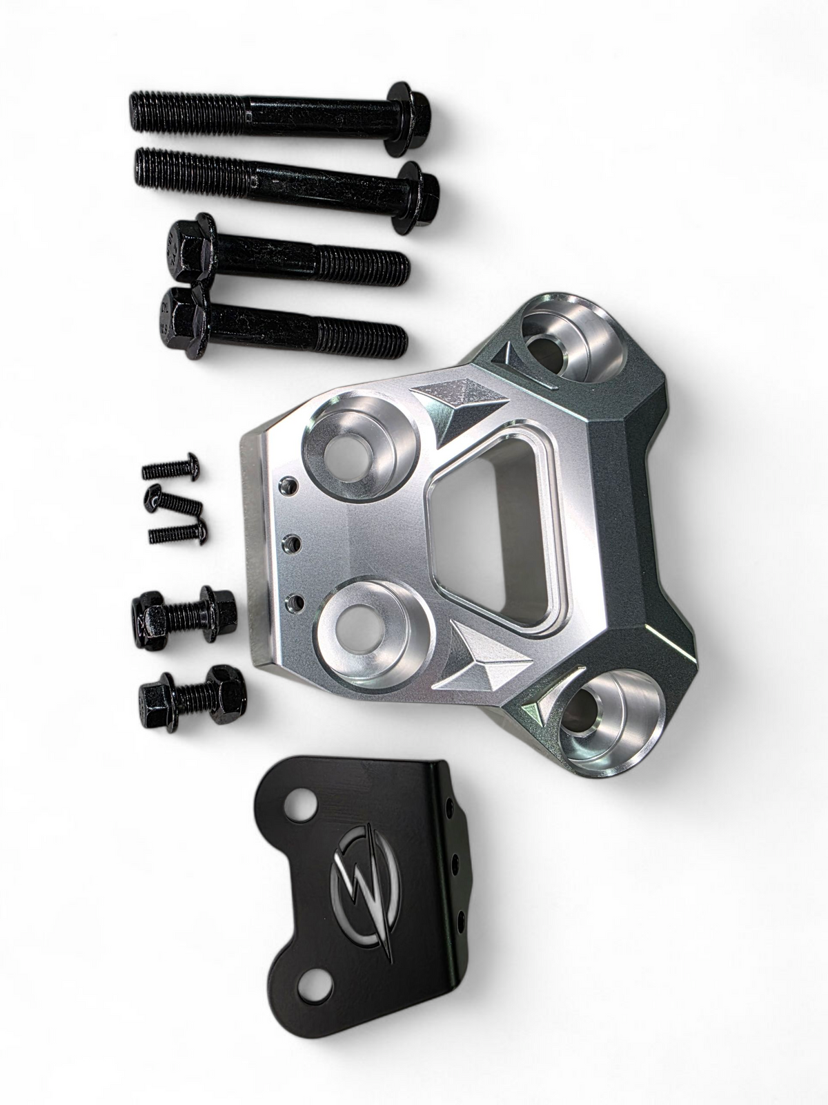 Clear anodized billet radius rod plate installed on Can-Am Maverick R protecting rear suspension heim joints