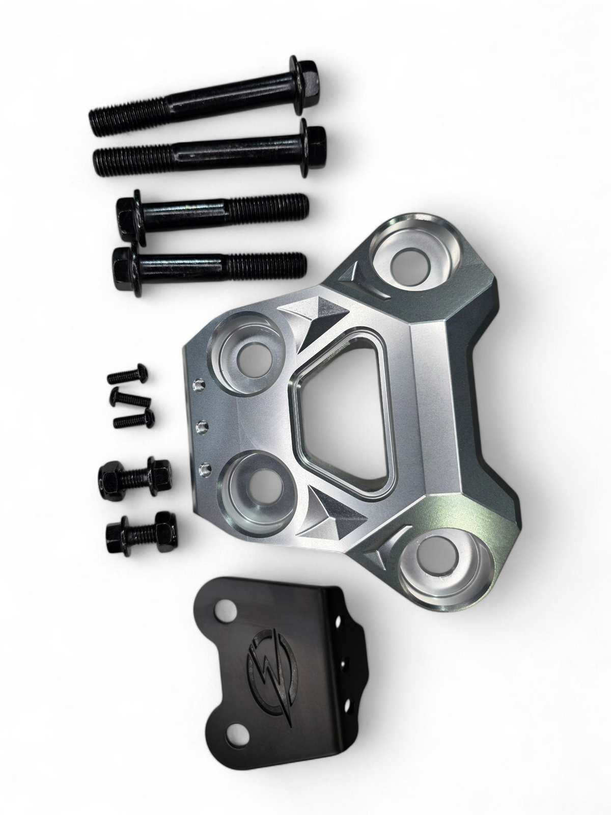 Detail of Can-Am Maverick R clear billet radius rod plate showing heim joint and rod bolt protection