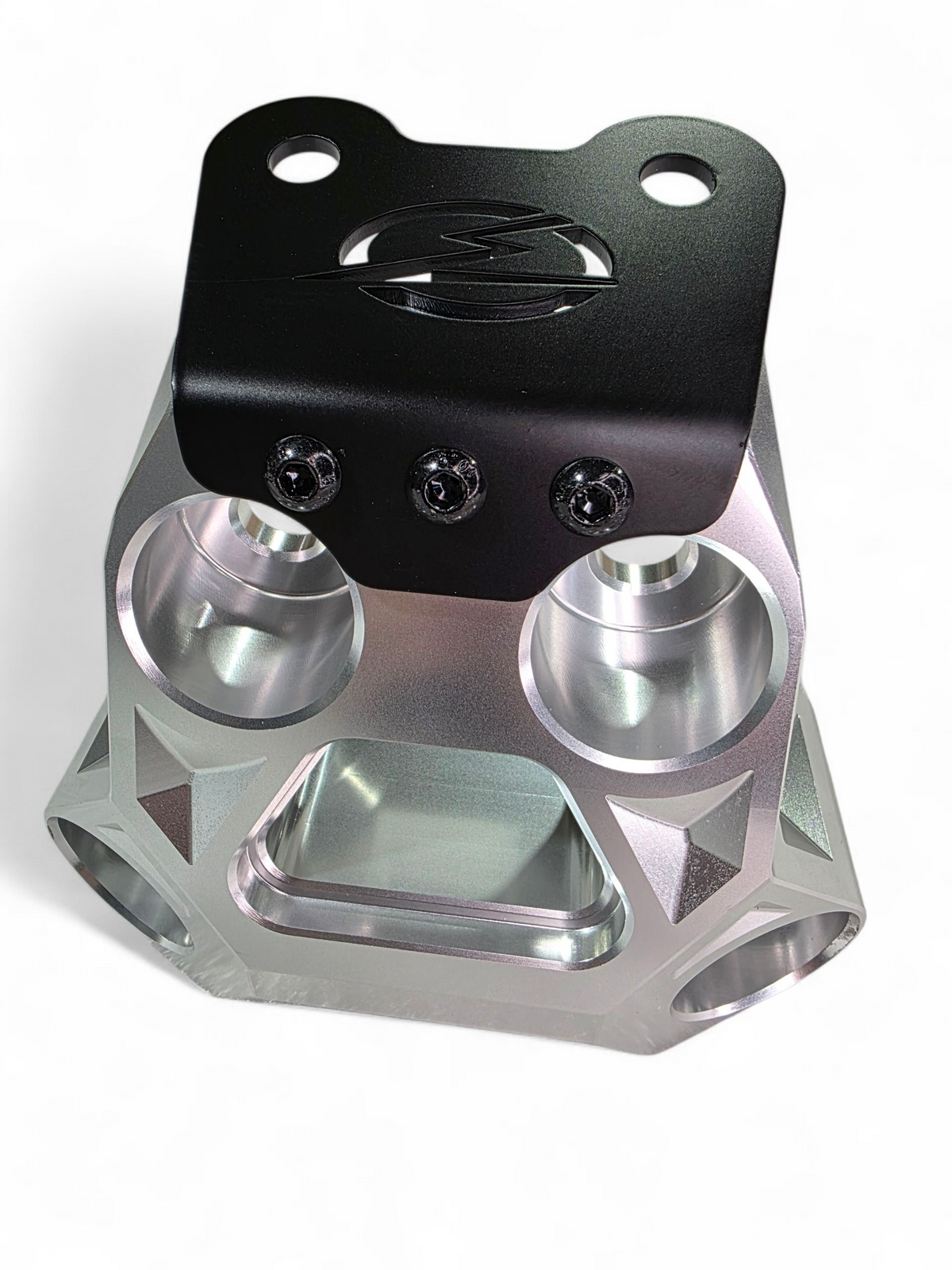 Machined 6061 billet aluminum surface visible through clear anodize on Can-Am Maverick R radius rod plate