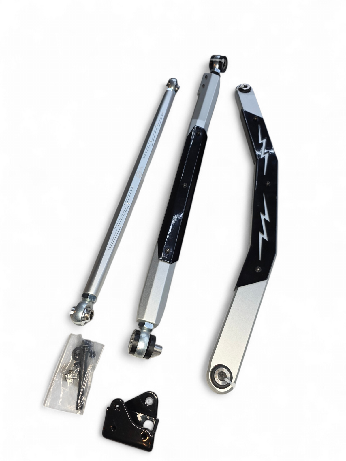 Close-up of adjustable Heim joint on Can-Am Maverick R High Clearance Radius Rod showing threaded adjustment and clear anodized 6061 billet finish