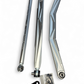 Mounting point detail on Can-Am Maverick R anodized clear radius rods showing direct bolt-in factory position installation