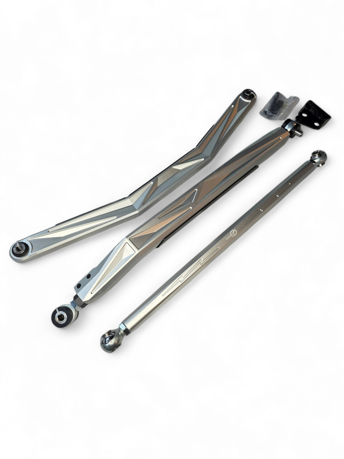 Can-Am Maverick R High Clearance Radius Rods mounted showing clearance gain over factory rods on technical terrain