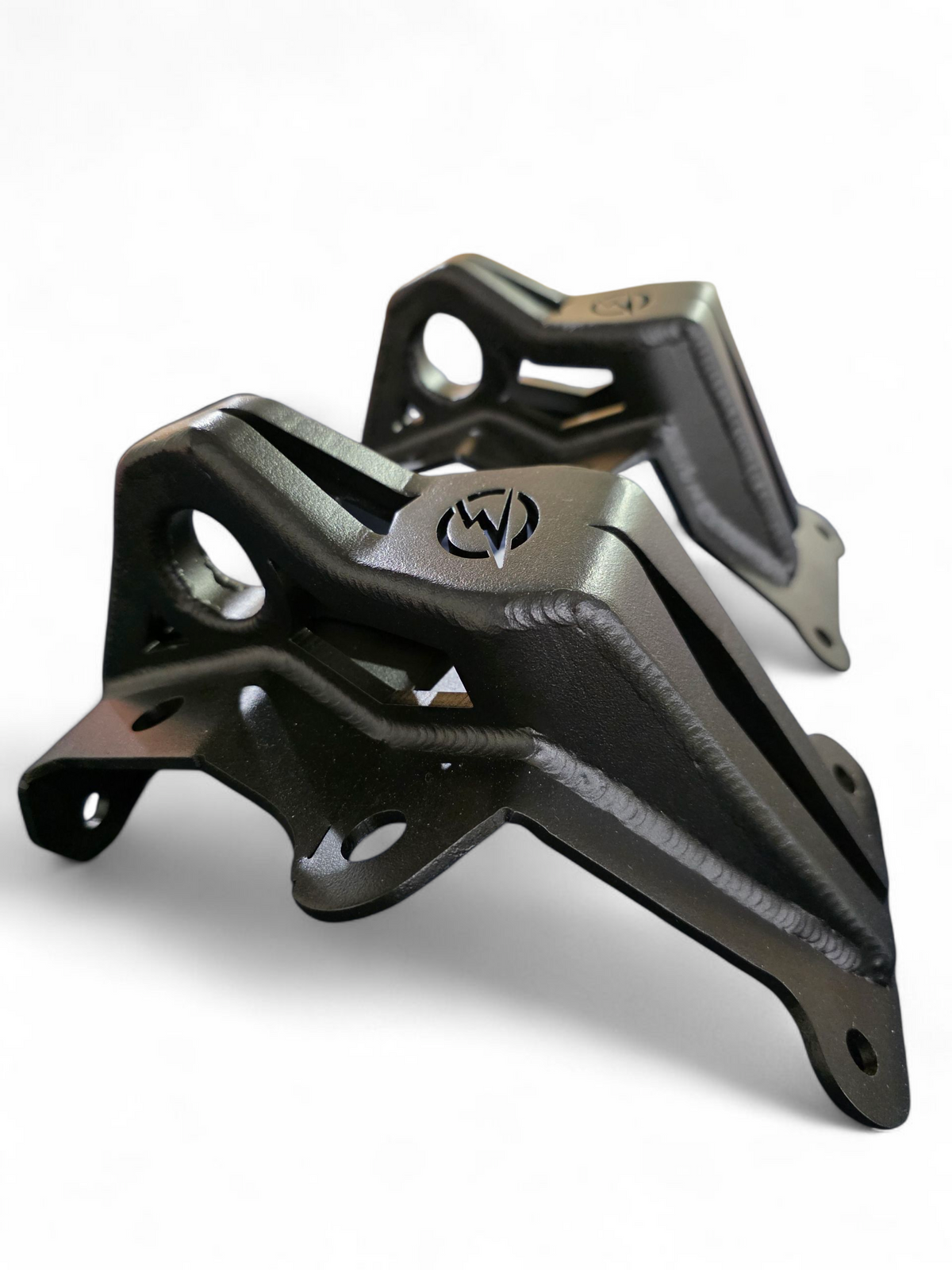 Steel radius rod plate installed on 4-seat Can-Am Maverick R reinforcing rear suspension