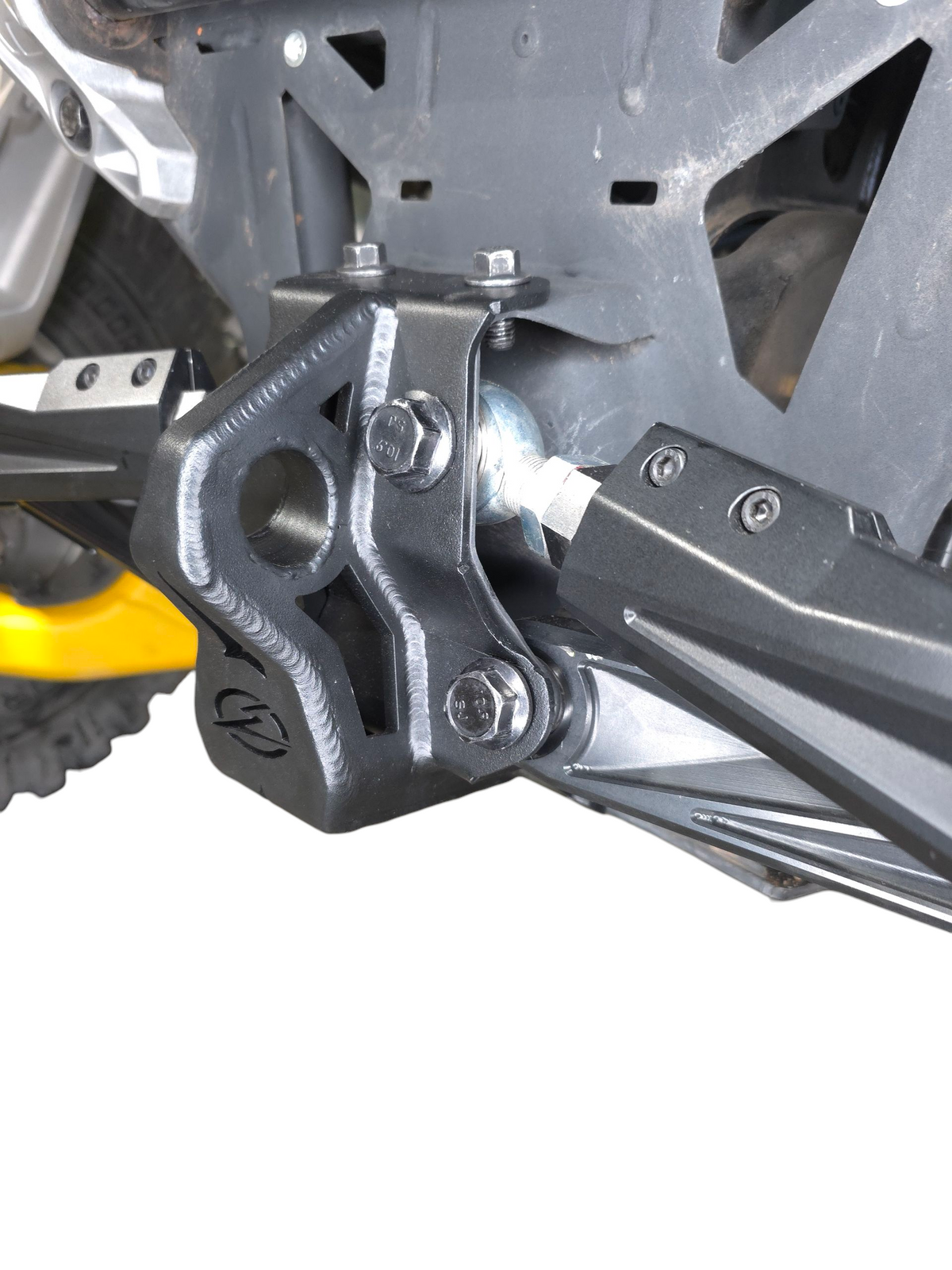Can-Am Maverick R sheet metal radius rod plate showing both RC model compatibility