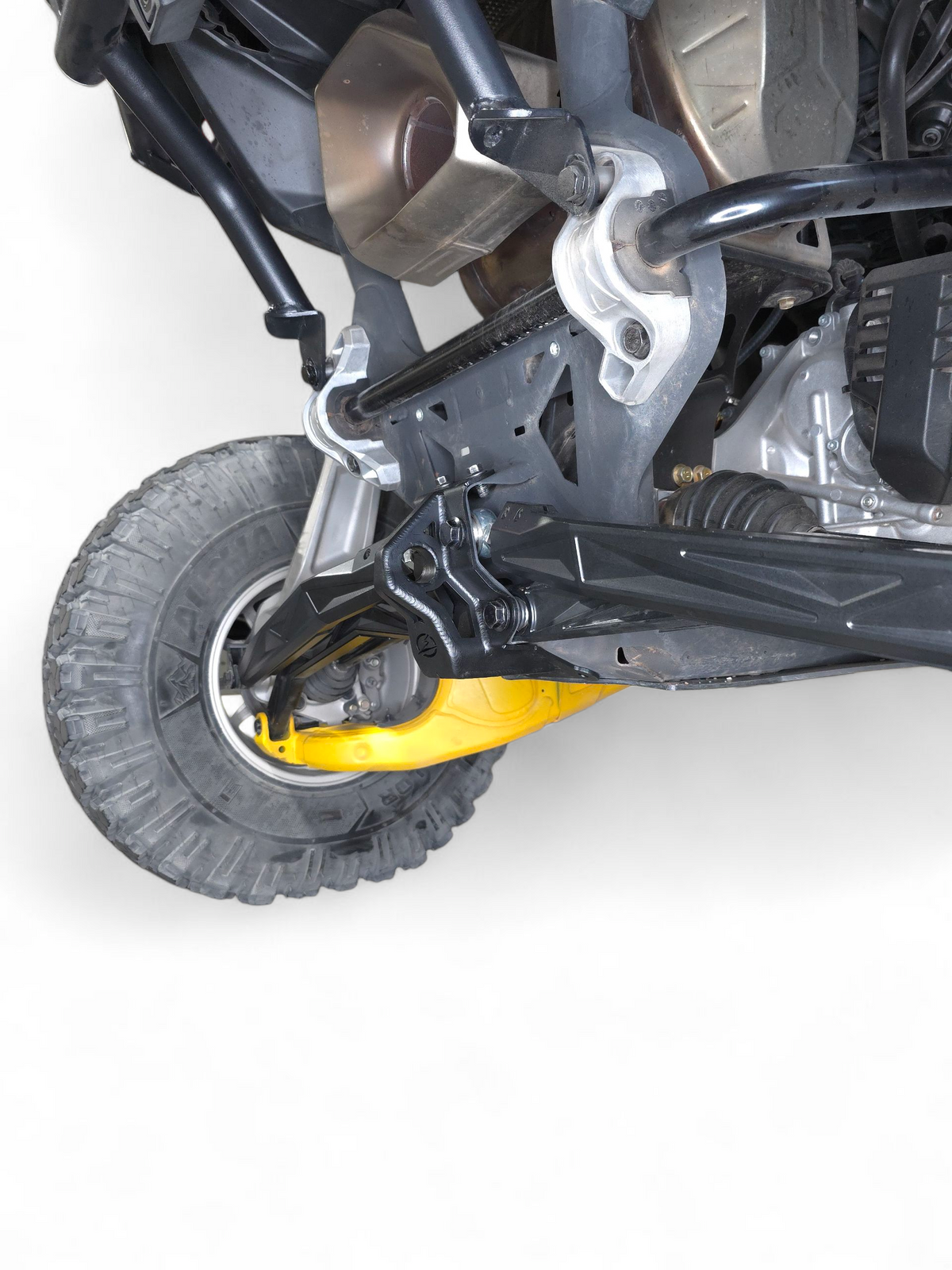 Underside view of Can-Am Maverick R steel radius rod plate showing protection coverage