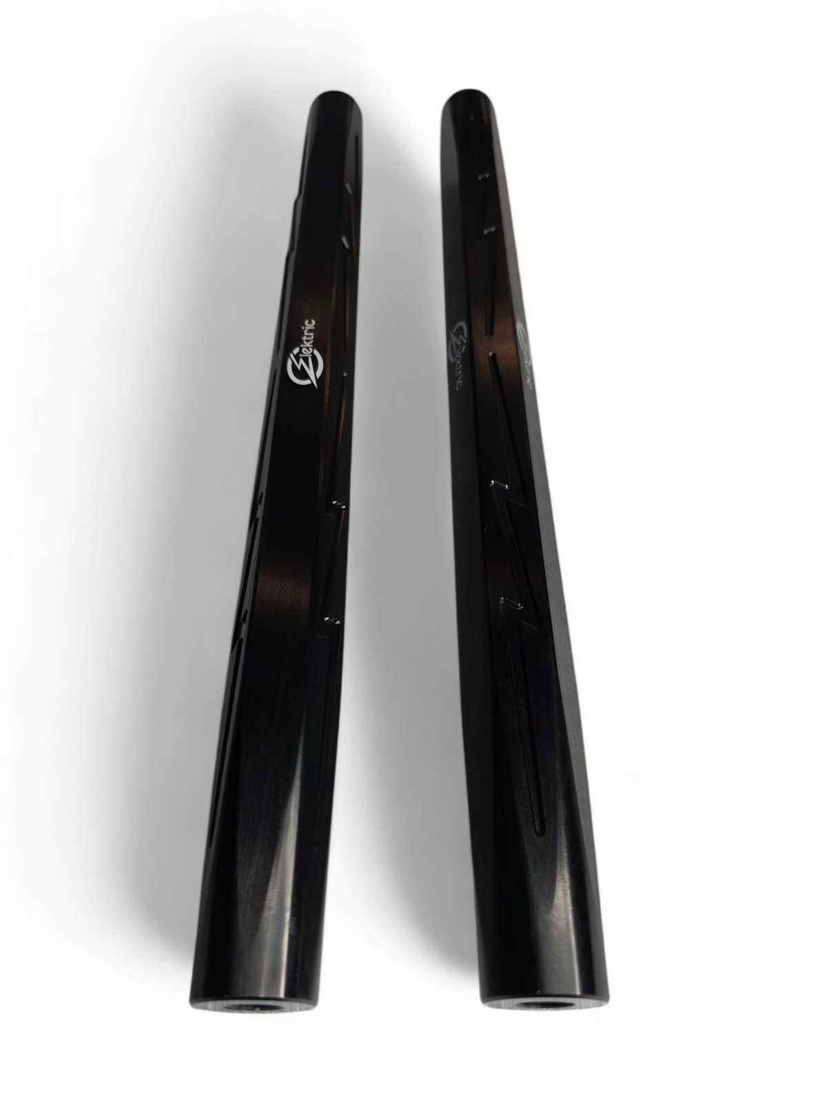 Close-up of an anodized black billet aluminum tie rod for the Can-Am Maverick R showing the CNC-machined surface