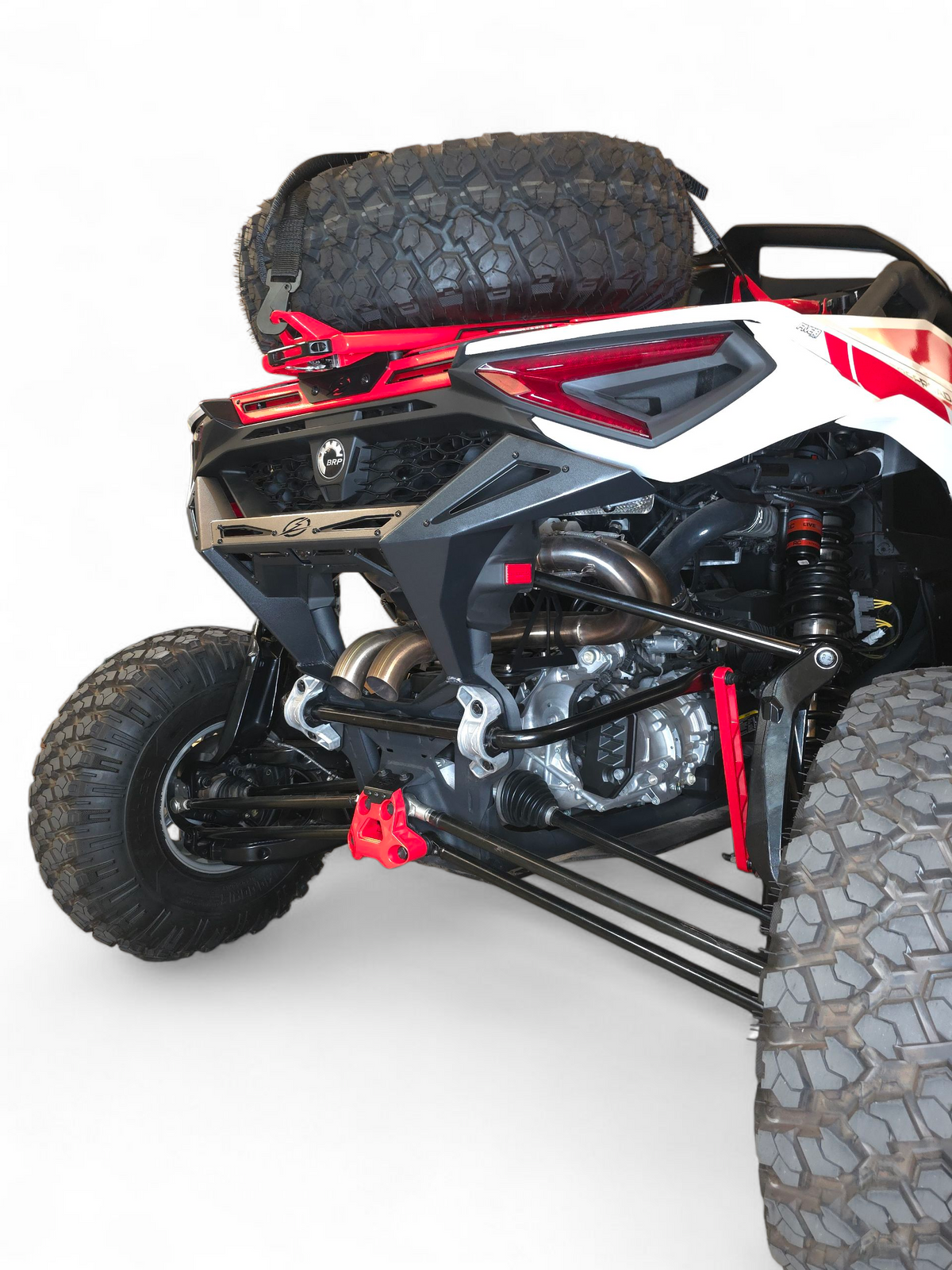 side rear quarter angle of 2024–2026 Can-Am Maverick R Max showing Volt Rear Bumper flush fitment along the full width of the 4-seat chassis