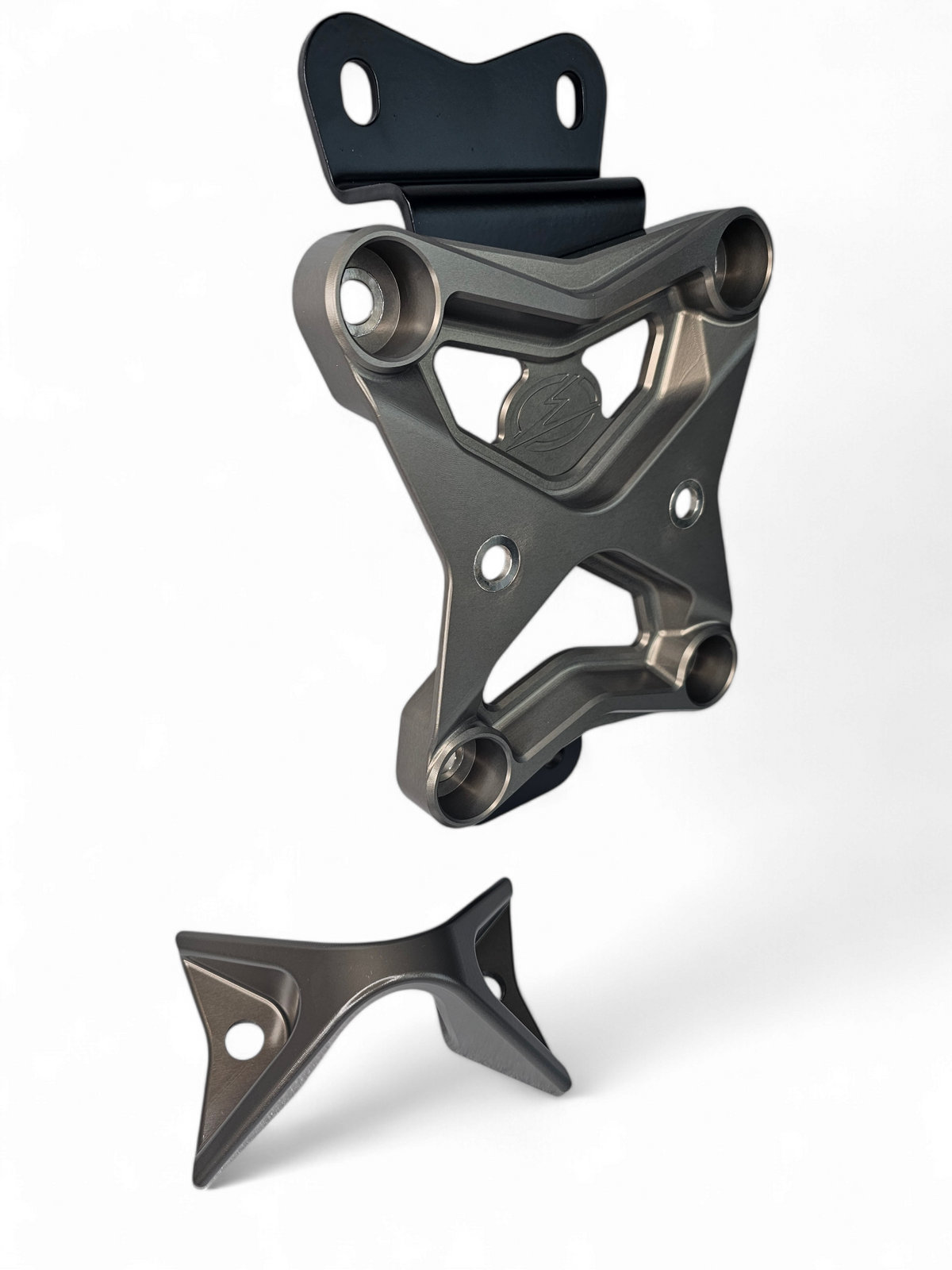 Gun metal 10-bolt radius rod plate shown installed on Can-Am Maverick X3 rear suspension