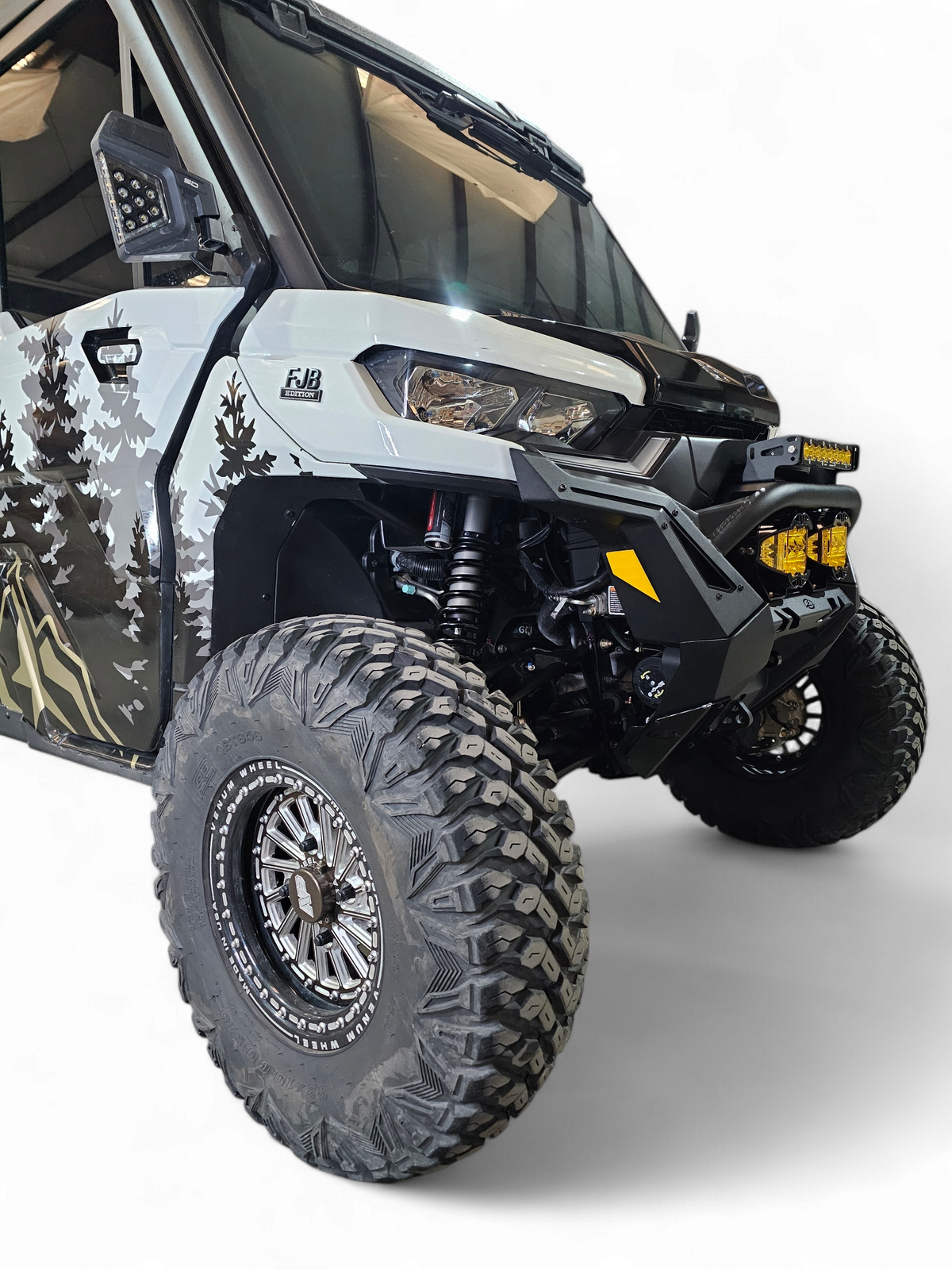Full machine front view of Can-Am Defender HD10 with Volt Front Winch Bumper installed