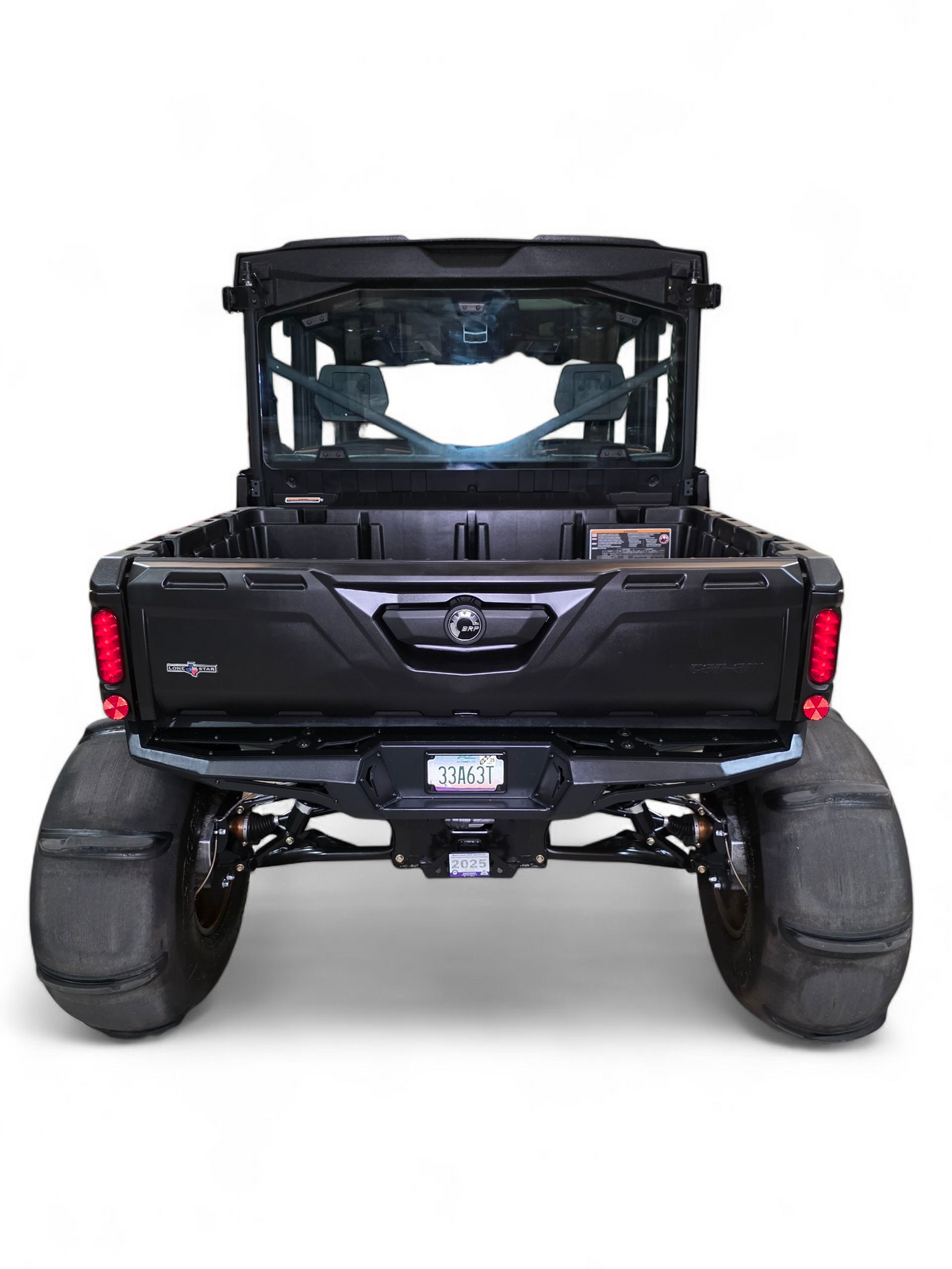 Volt Rear Bumper installed on Can-Am Defender HD10 showing license plate mount and hammer black finish