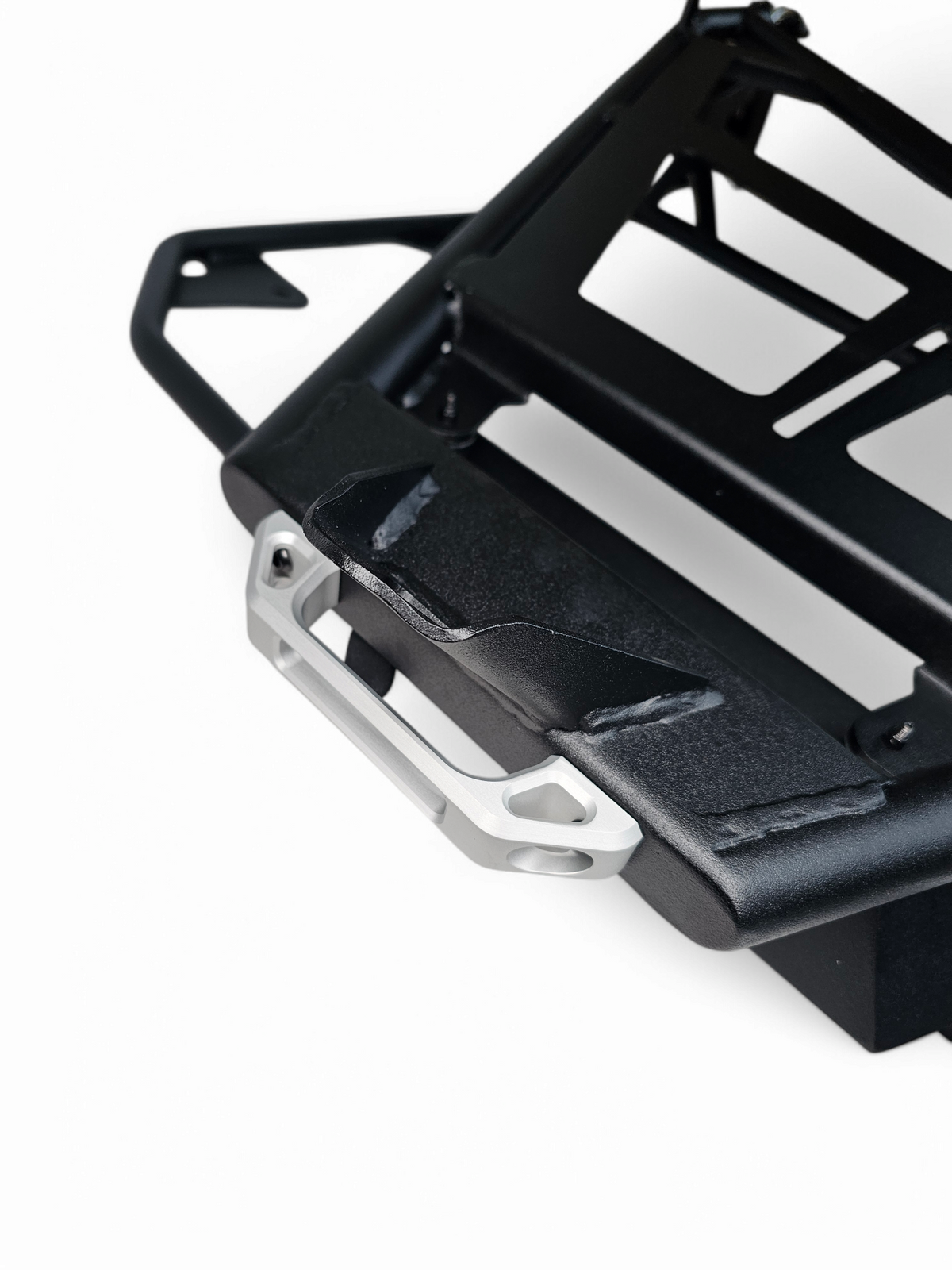 Billet aluminum handle detail on EOD Volt Tire Rack for Can-Am Maverick R showing machined finish and grip quality