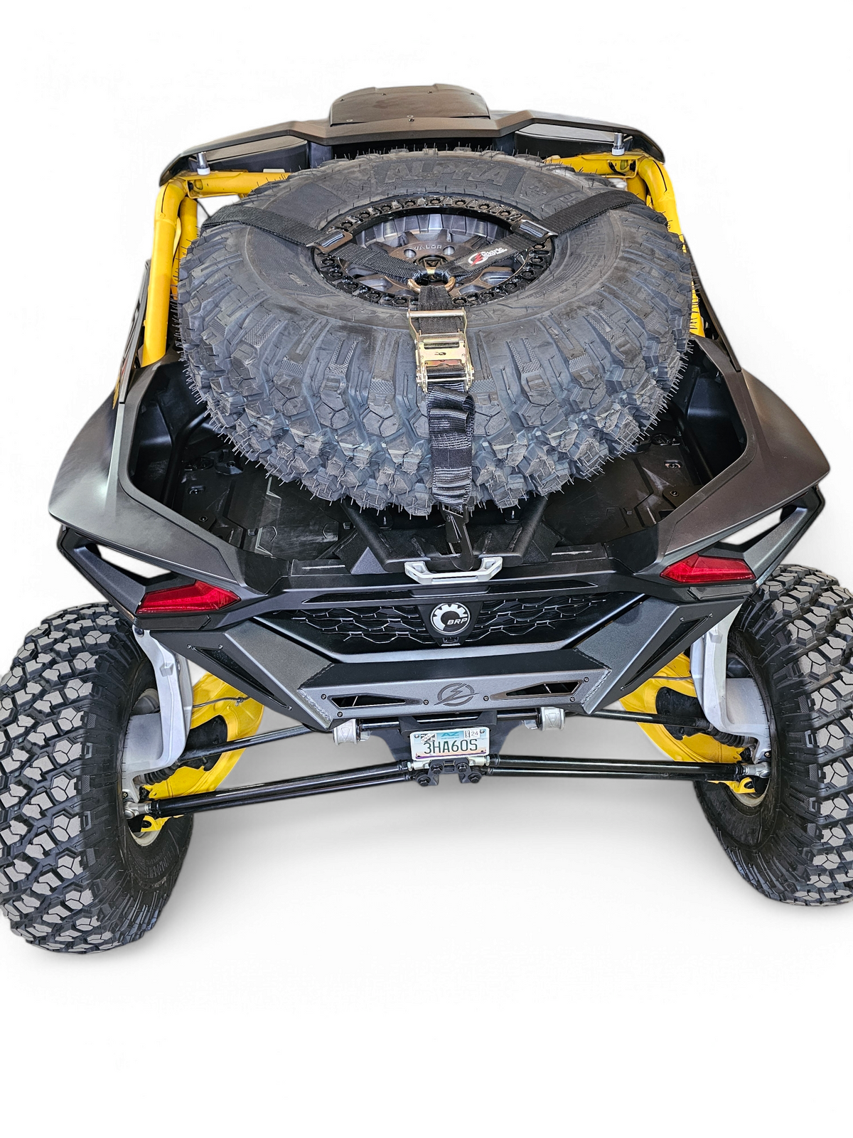 Can-Am Maverick R EOD Volt Tire Rack with tire hold down mounts and Y strap visible securing spare tire position