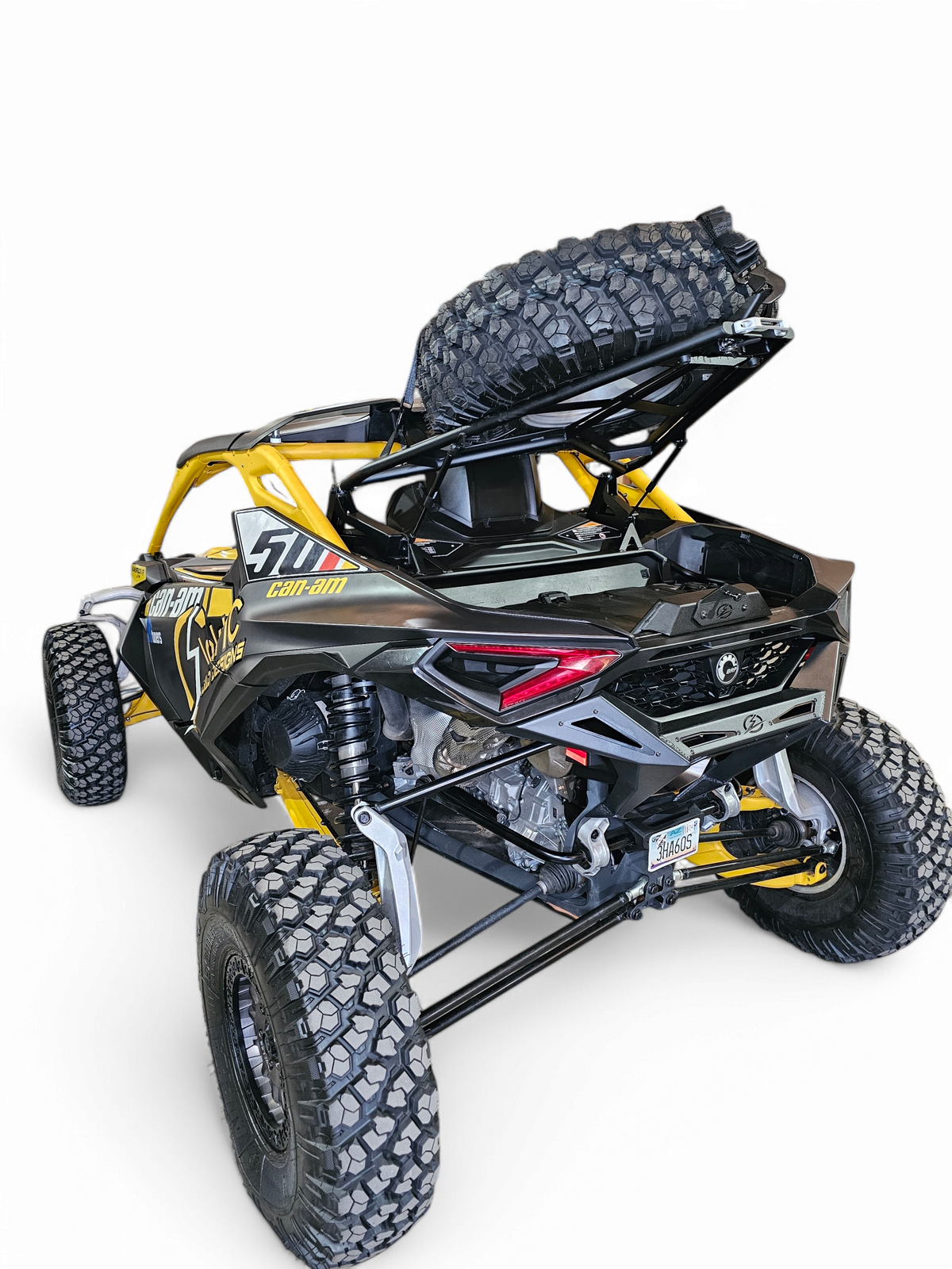 Can-Am Maverick R EOD Volt Tire Rack mounted on rear of vehicle showing hammer black powder coat finish and full installation profile