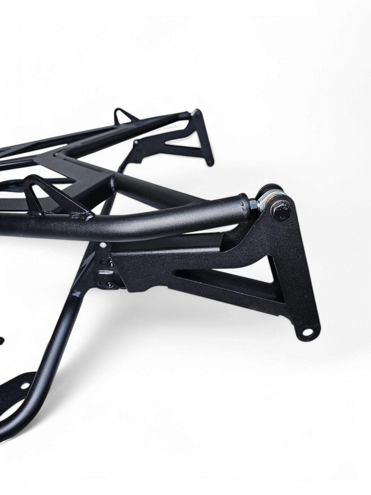 Hammer black powder coat finish detail on Can-Am Maverick R EOD Volt Tire Rack showing textured surface and chip resistance