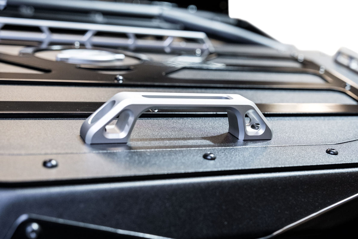 Gear loaded inside Can-Am Maverick X3 Baja Bed Box demonstrating storage capacity