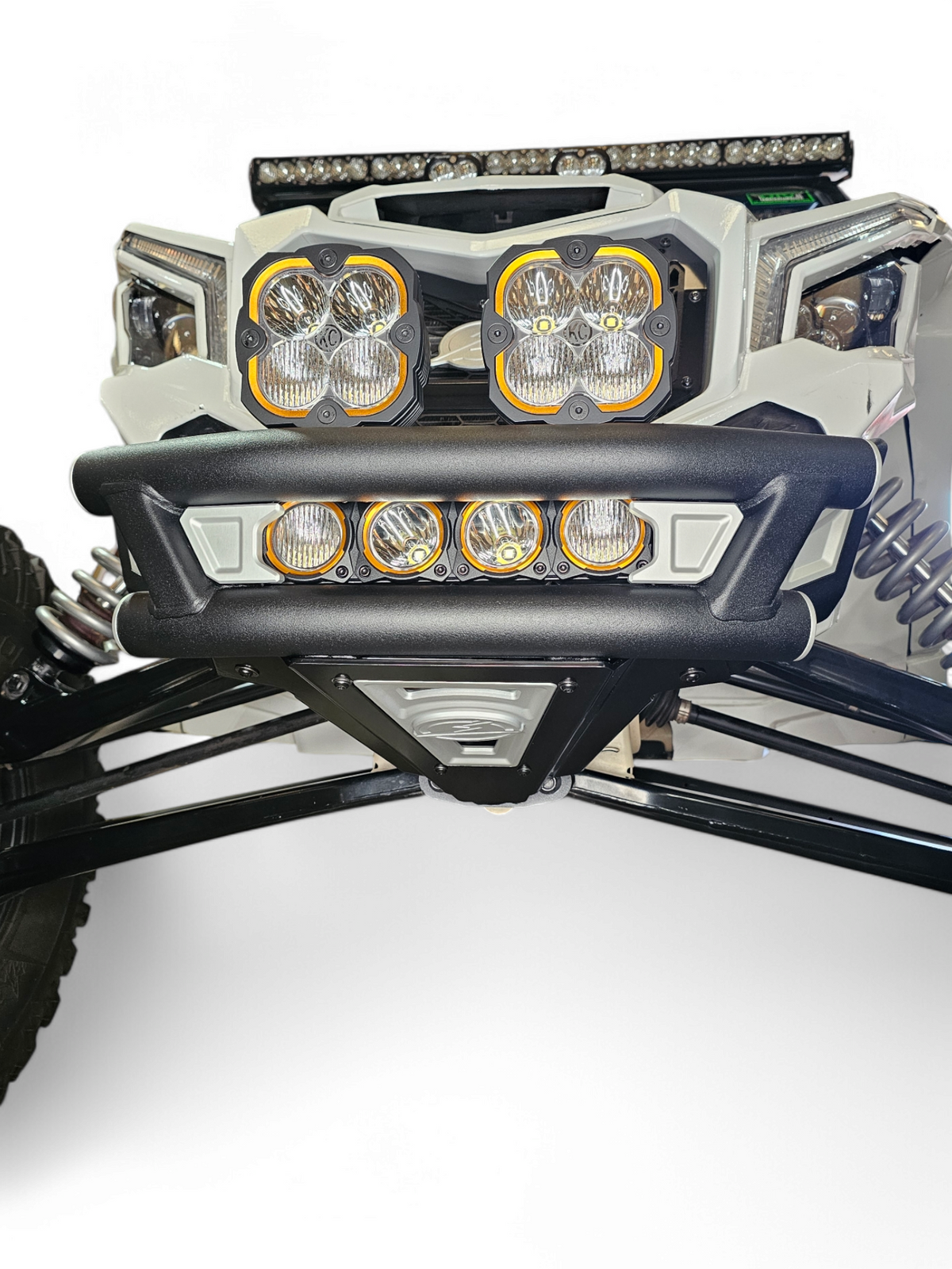 Passenger side view of Can-Am Maverick X3 Amp front bumper showing body-line fitment